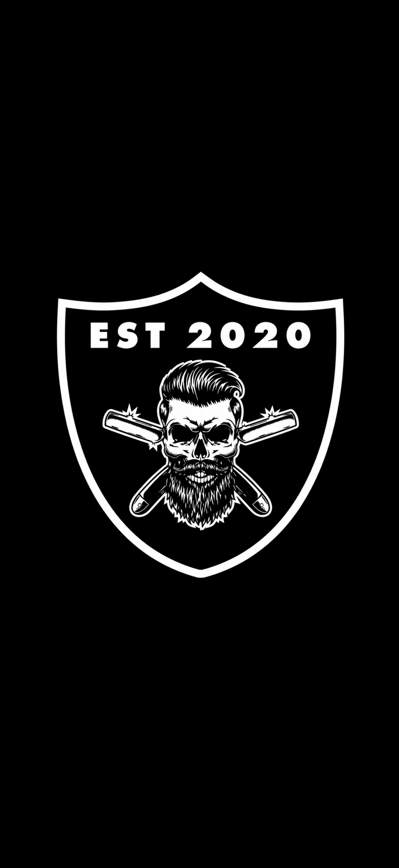 Moreton Hall Barbers shield logo, established 2020, with a bearded skull and crossed razors